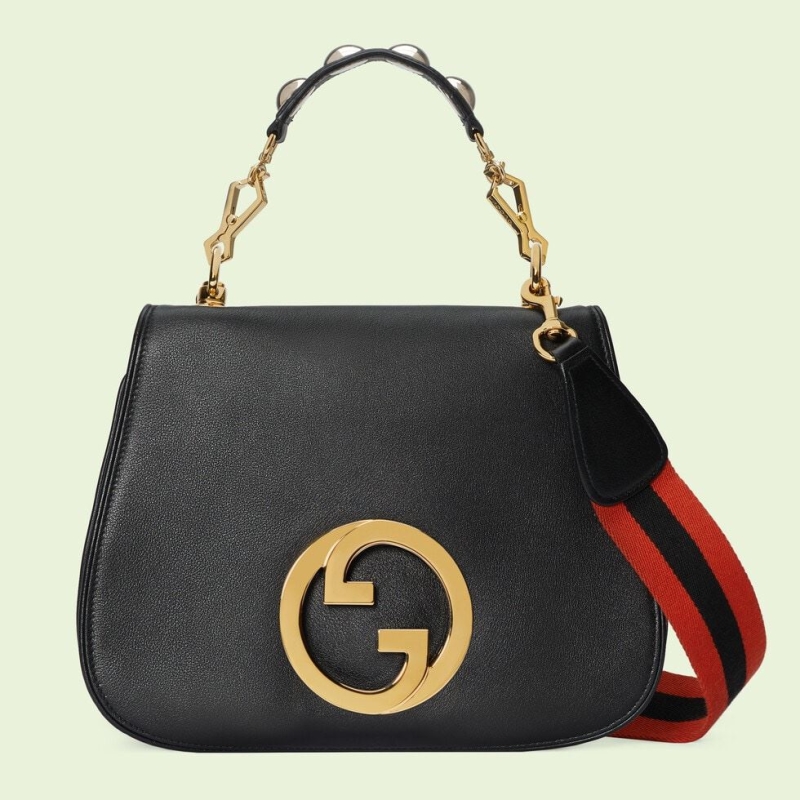 G*u*i top handle bags